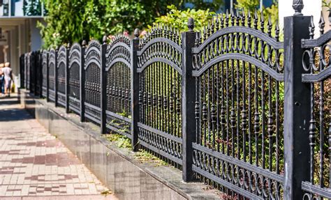 what is metal fence called in front of house|metal fence styles.